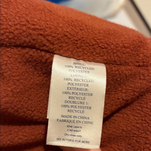 Faherty Cream with Rust Fleece sheepskin style vest - Picture 10 of 10